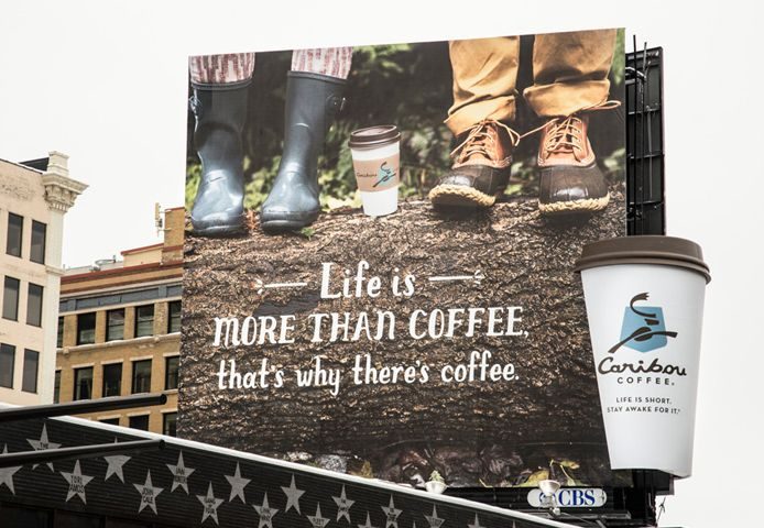 business advertisements on coffee cup vs bill board gingercup