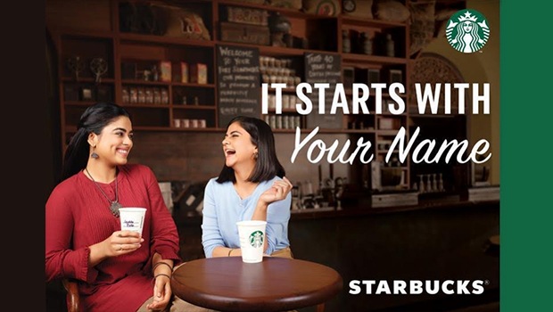 This image shows two ladies sitting at Starbucks having coffee and laughing in marketing campaigns of Starbucks