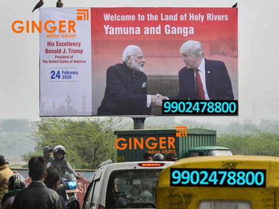 Billboard Advertising in Agra on red and white board