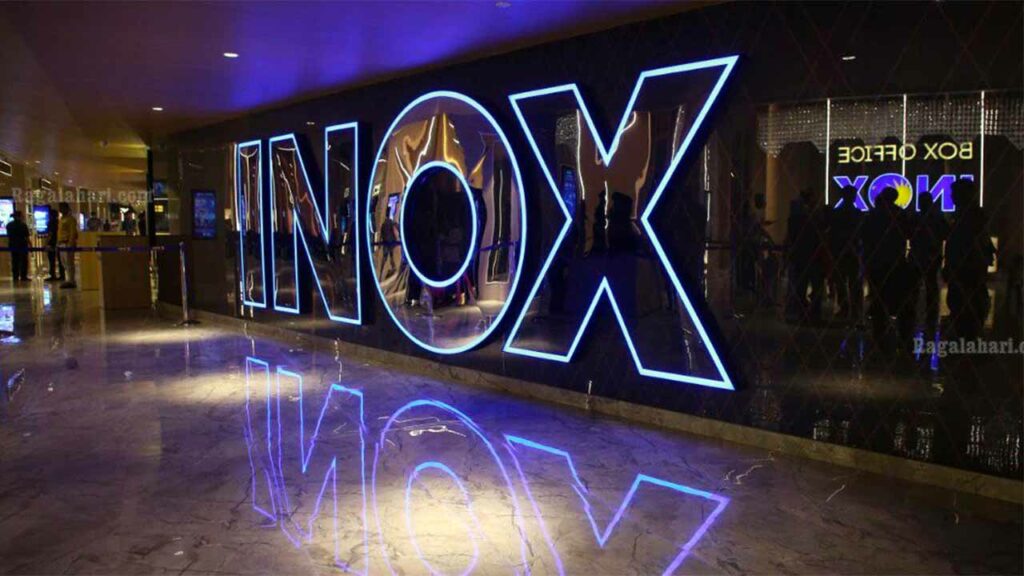 an inox theater sign