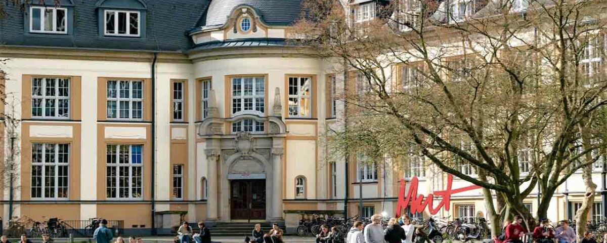 A crowd in the school ground for admissions