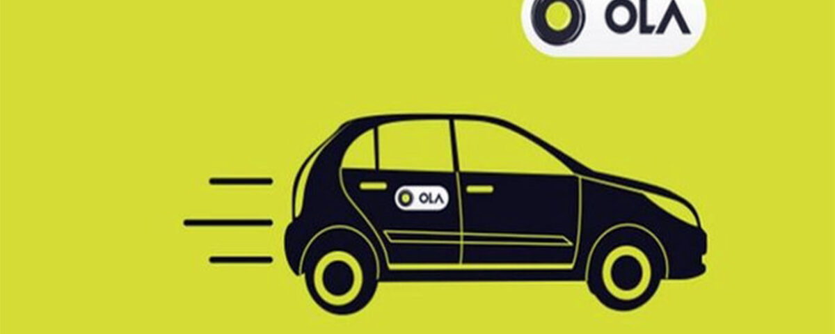 A cab with the Ola logo on a yellow backdrop