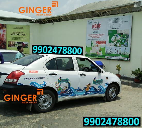 Cab Advertising in Jaipur with white and red color