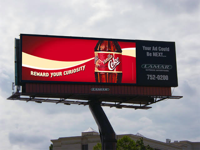 a digital billboard advertising coke