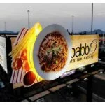 Billboards displaying restaurant speciality
