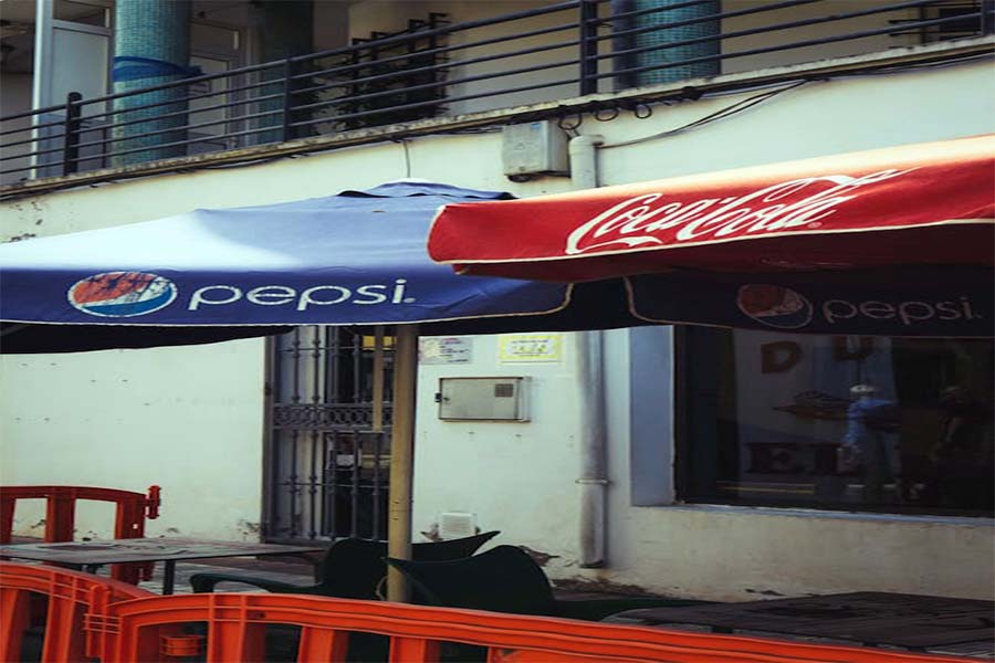 Sunshades advertising chilled beverages in summers.