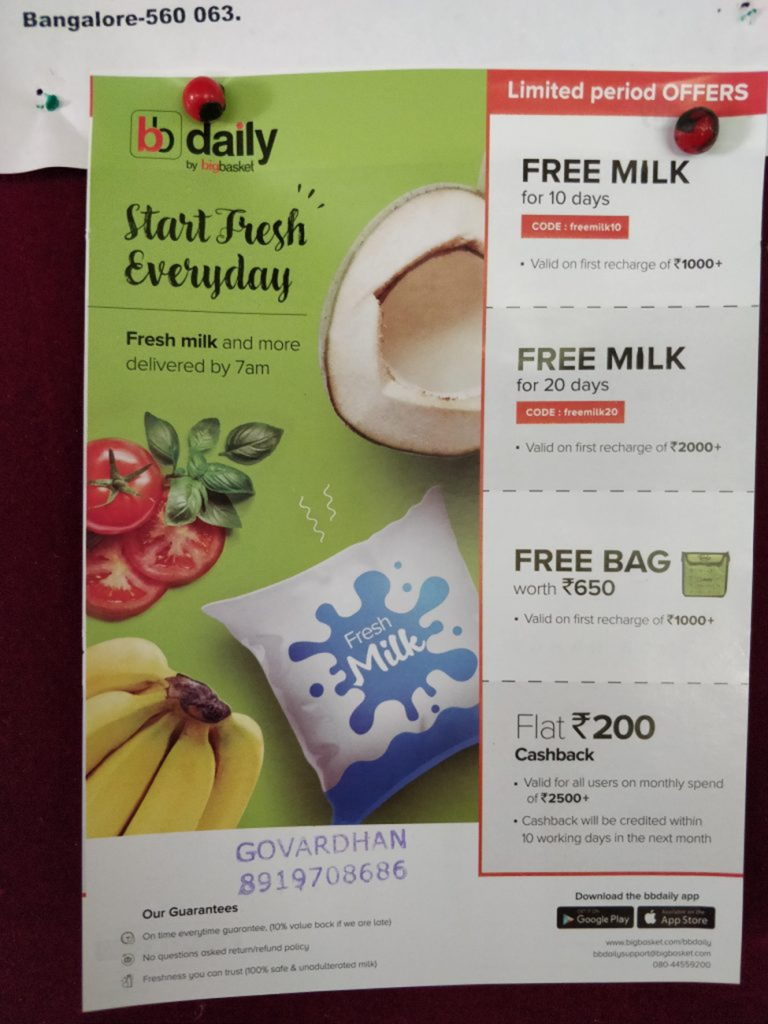 Local Flyer and Poster Promotion Printed promotional flyer pinned on a board advertising daily milk delivery offers