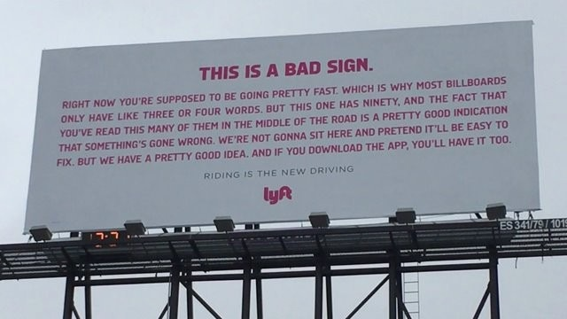 Lyft Billboard with Long Copy – OOH Design Mistake Lyft billboard with excessive text demonstrating poor readability in outdoor advertising