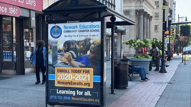 Newark Educators Bus Shelter Advertising Campaign Bus shelter advertising panel promoting Newark Educators Community Charter School enrollment for the academic year.