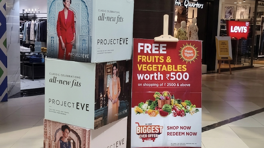 Mall Standee and Kiosk Advertising for Shopper Engagement retail standee advertising and promotional kiosk inside shopping mall walkway
