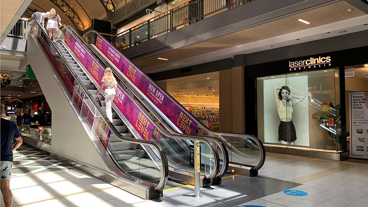 Escalator Branding for High Impact Mall Advertising escalator advertising panels in shopping mall targeting high footfall consumer traffic